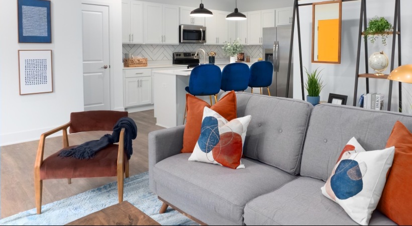 living area that includes ample seating spaces and bright lighting